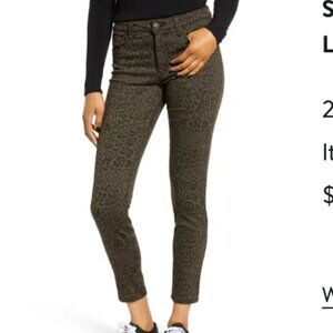 STS Blue leopard print skinny jeans, size 27